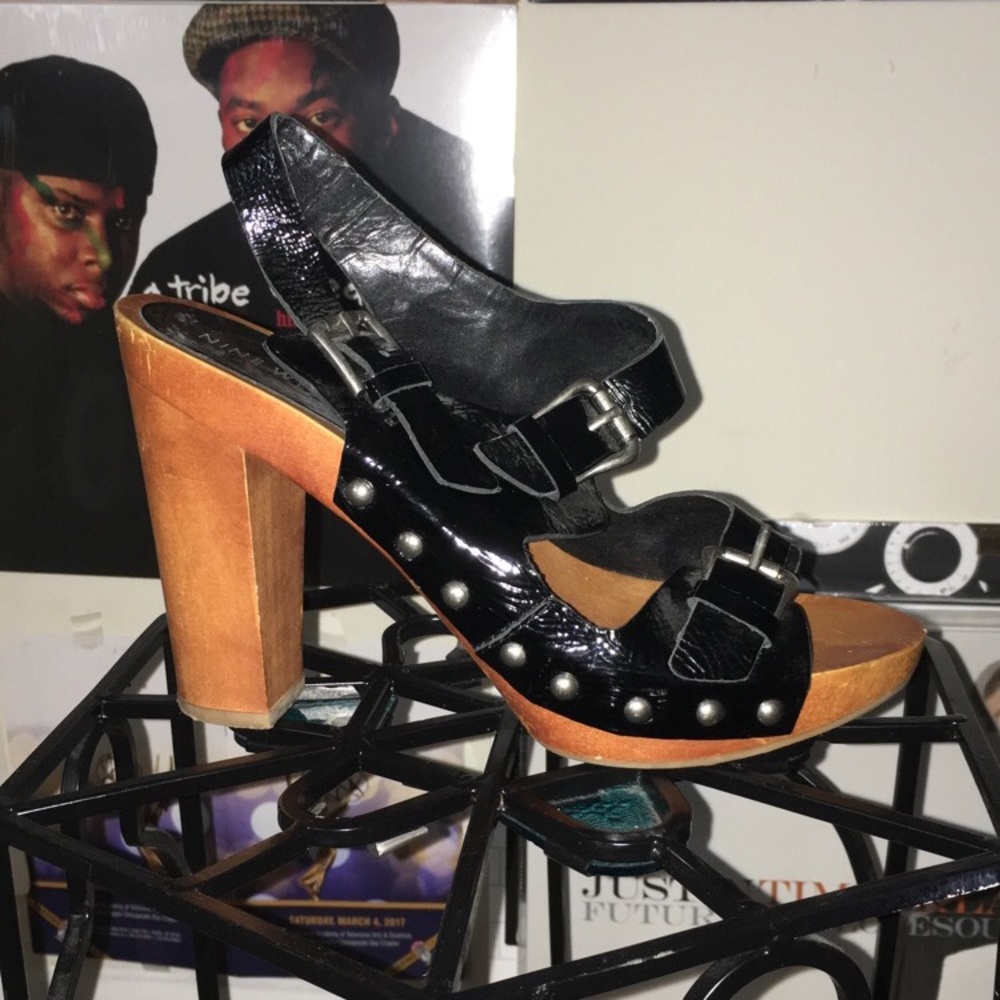 Black and brown high heel clogs